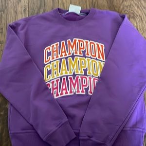 Women’s purple champion sweatshirt